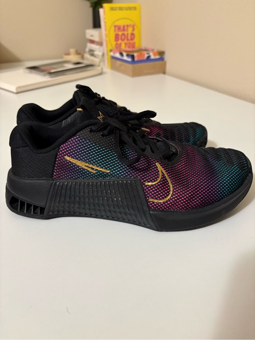 Nike Metcon 9 Black Trainers with Purple-to-Teal Gradient and Gold Accents